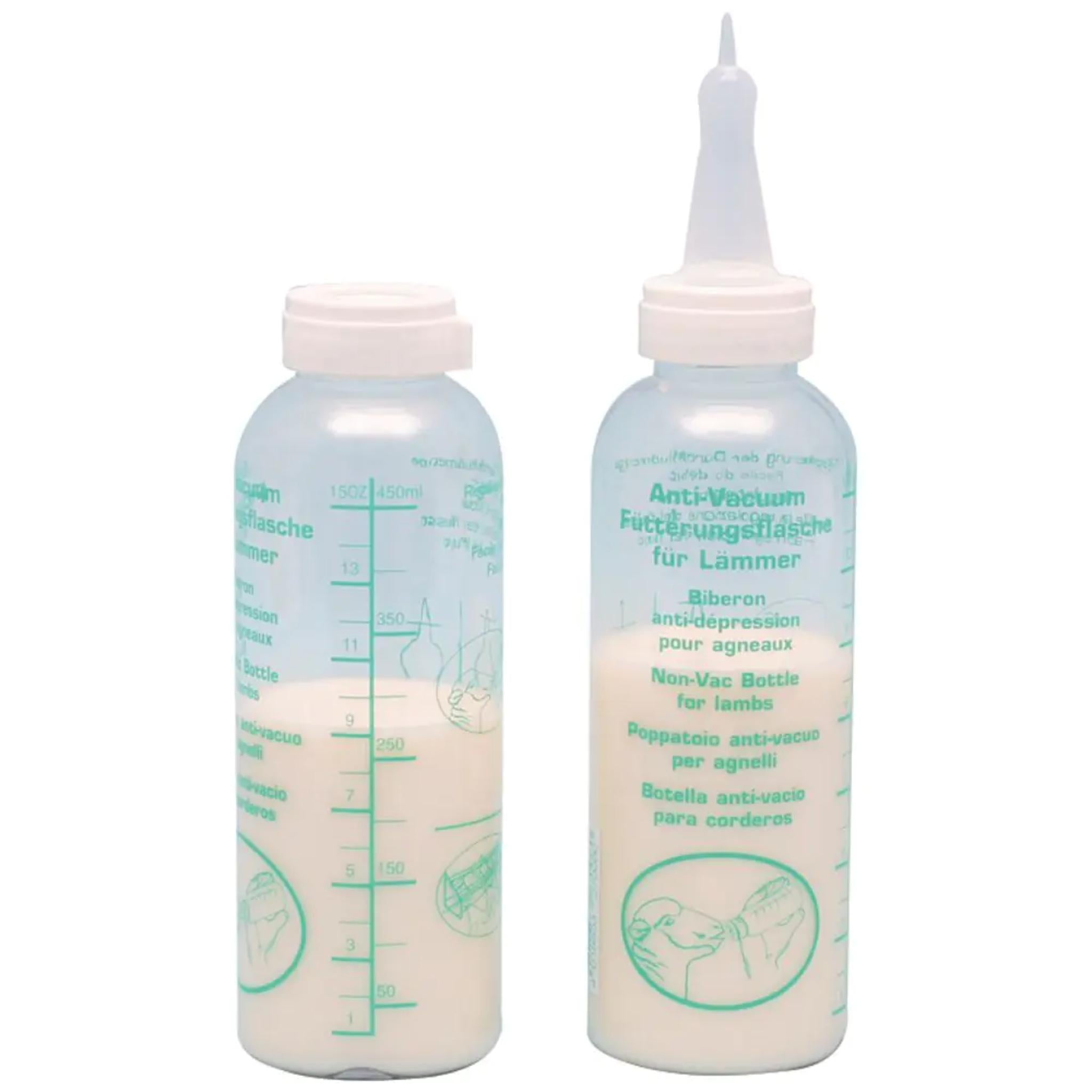 Two baby bottles with measurement markings on a white background
